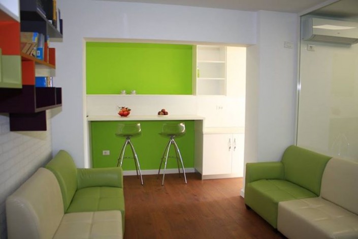 Lounge with bar stools and sofas